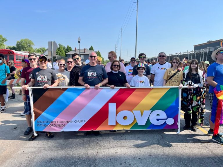 Photos of Resurrection Lutheran Church marching in Indy Pride 2023, photo 1 of 18